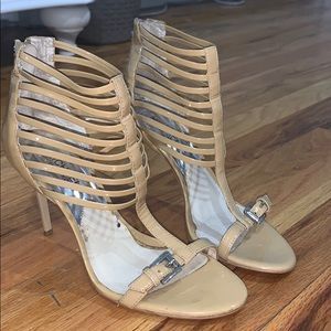 Tan patent leather Michael Kors heels.